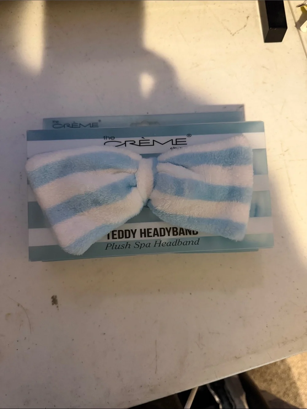 The Crème Plush Teddy Headband in Light Blue & White